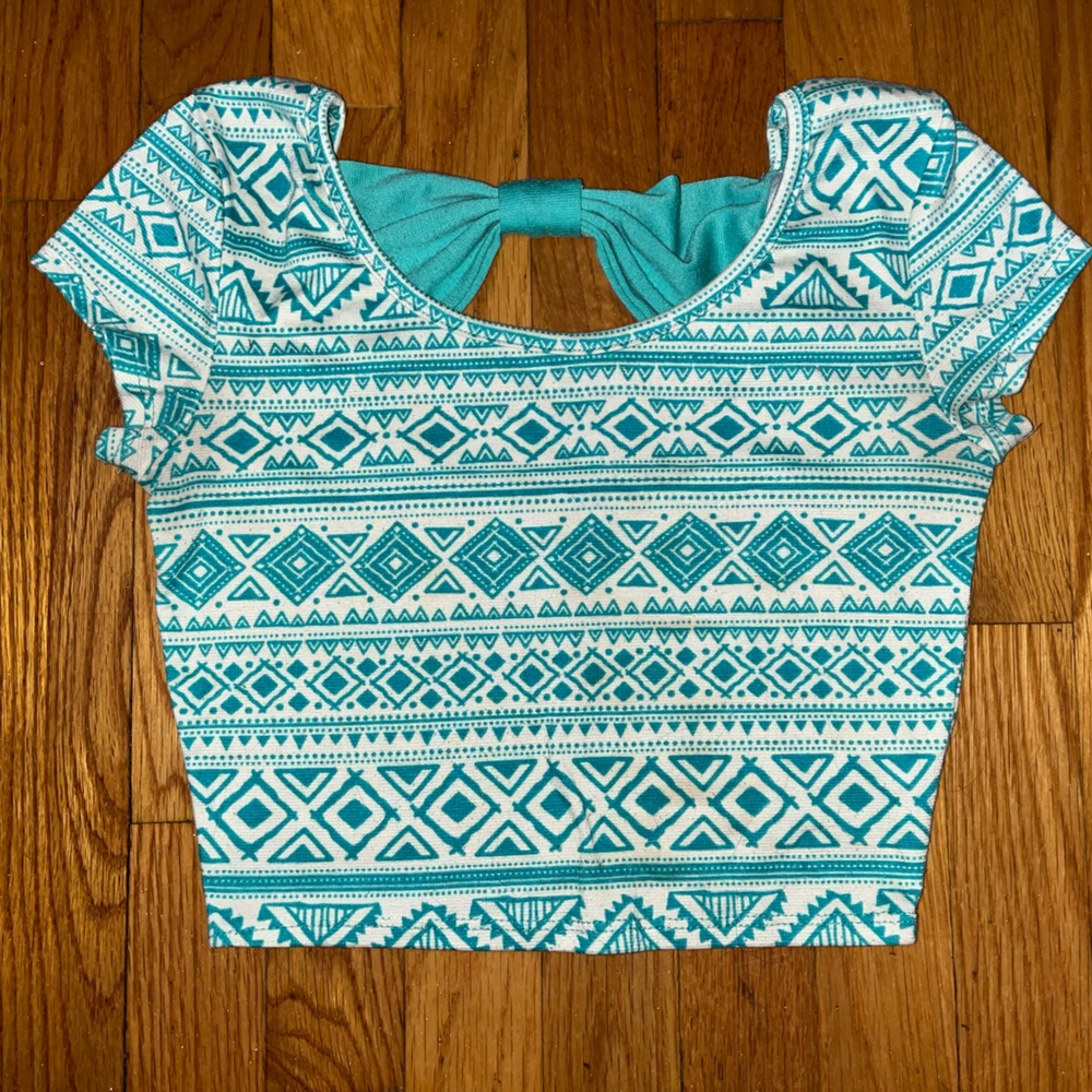 Size small used Charlotte Russe crop top with bow on back side!! Good condition!